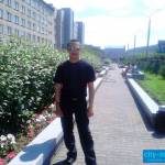 николай