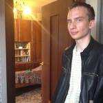 николай